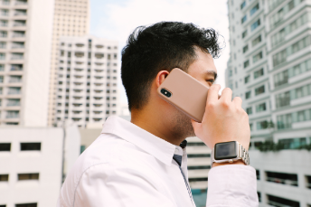 Man talking on phone ATS Connection