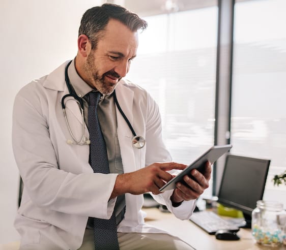 Doctor using ipad
