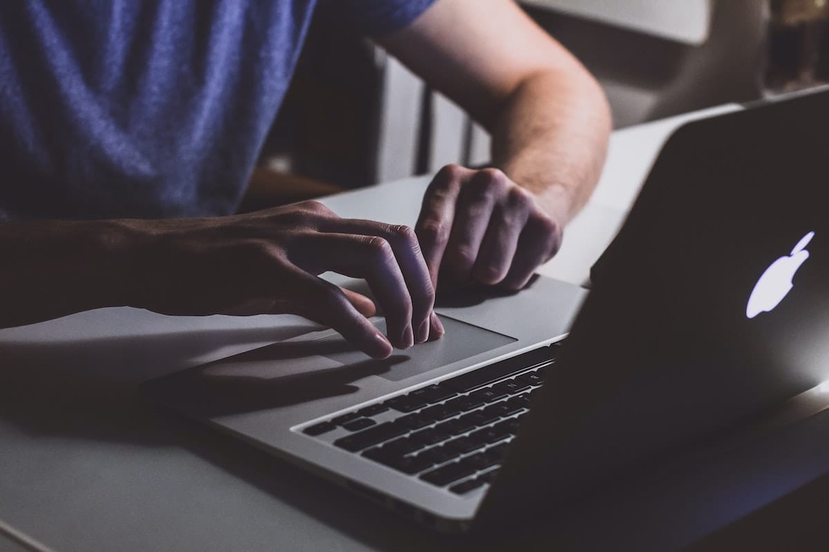 Man working on Apple iMac ATS Connection